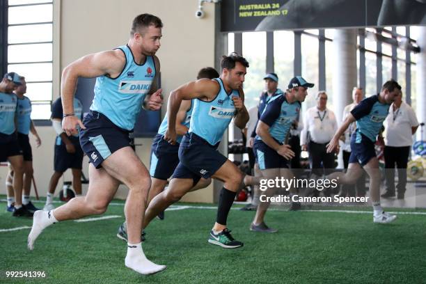 Nick Phipps of the Waratahs and team mates perform a drill during a Waratahs Super Rugby training session at Allianz Stadium on July 6, 2018 in...