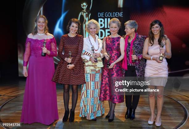 Award winners Anja Gehlken from "Schaki e.V." , Ninon Demuth from "Über den Tellerrand e.V.", Bettina Landgrafe from "Madamfo Ghana e.V.", Julia...