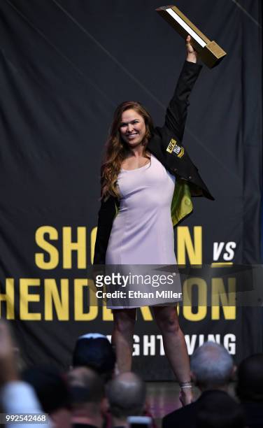 Ronda Rousey poses onstage after becoming the first female inducted into the UFC Hall of Fame at The Pearl concert theater at Palms Casino Resort on...