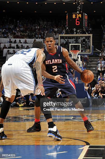 Joe Johnson of the Atlanta Hawks looks to make a move against Matt Barnes of the Orlando Magic in Game Two of the Eastern Conference Semifinals...