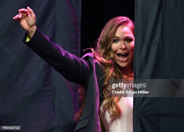 Ronda Rousey waves as she leaves the stage after becoming the first female inducted into the UFC Hall of Fame at The Pearl concert theater at Palms...