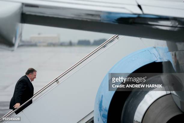 Secretary of State Mike Pompeo boards his plane after a stopover in Japan at Yokota Air Force Base in Fussa on July 6 to travel to North Korea's...