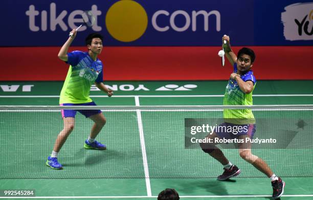 Tontowi Ahmad and Liliyana Natsir of Indonesia compete against Zhang Nan and Li Yinhui of China during the Mixed Doubles Quarter-final match on day...