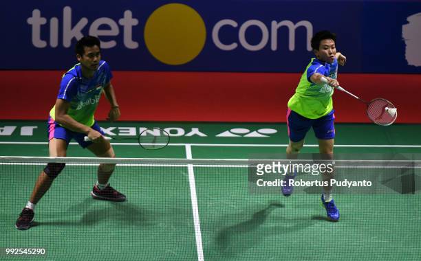 Tontowi Ahmad and Liliyana Natsir of Indonesia compete against Zhang Nan and Li Yinhui of China during the Mixed Doubles Quarter-final match on day...