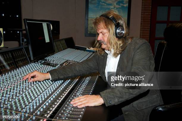 German musician and producer leslie Mandoki at the mixing desk in the Mandoki Studio in Tutzing, Germany, 23 october 2017. The German soap opera...