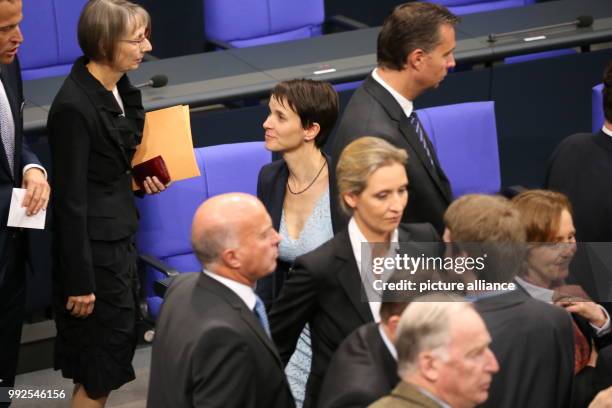 Independent MP Frauke Petry in conversation with fellow MPs during the constitutive session of the nineteenth German parliament in Berlin, Germany,...