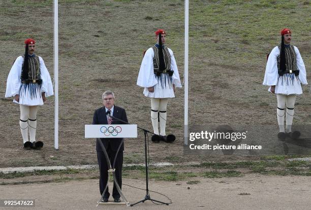 President Thomas Bach gives a talk at the ceremonial lighting of the olympic torch in Olympia, Greece, 24 October 2017. The South Korean city of...