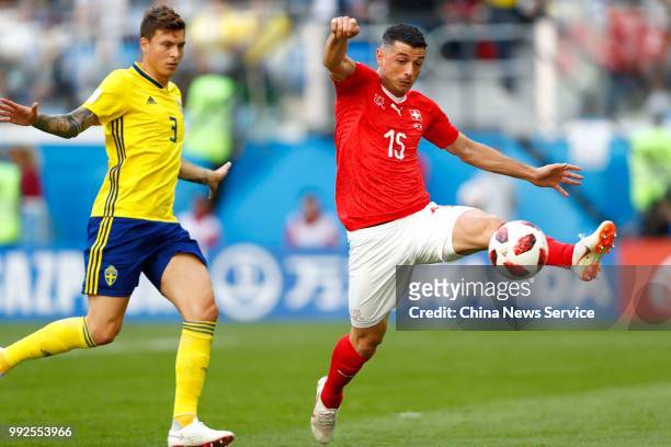 Blerim Dzemaili of Switzerland kicks the ball during the 2018 FIFA World Cup Russia Round of 16 match between Sweden and Switzerland at the Saint...