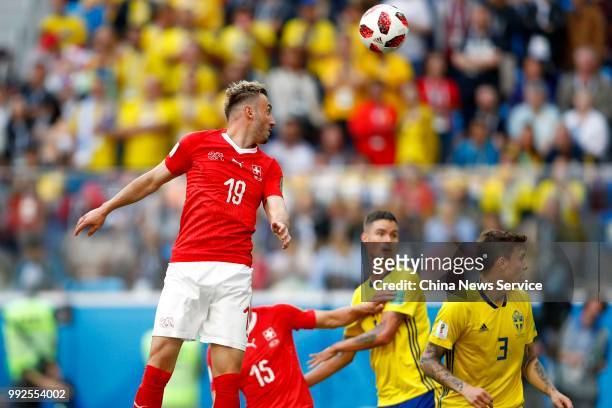 Josip Drmic of Switzerland heads the ball during the 2018 FIFA World Cup Russia Round of 16 match between Sweden and Switzerland at the Saint...