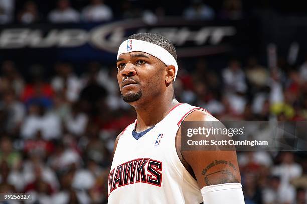 Josh Smith of the Atlanta Hawks walks across the court in Game Three of the Eastern Conference Semifinals against the Orlando Magic during the 2010...