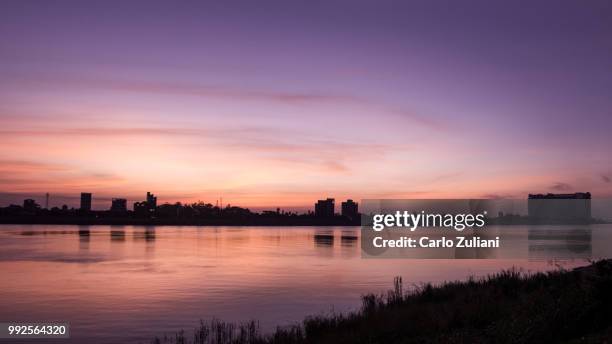 sunrise in phnom penh - zuliani stock pictures, royalty-free photos & images