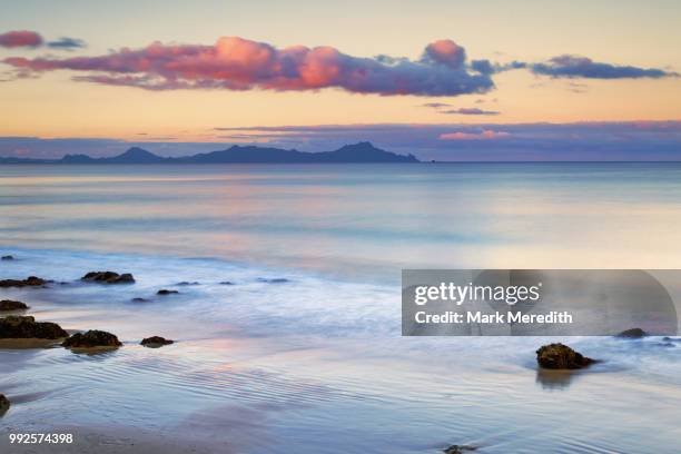 sunset at langs beach near whangarei - whangarei heads stock pictures, royalty-free photos & images