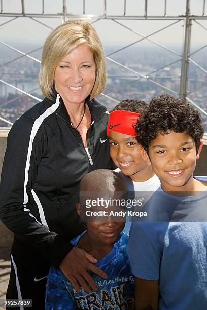 Chris Evert and children from the Harlem Junior Tennis and Education Program celebrate National Tennis Month at The Empire State Building on May 13,...