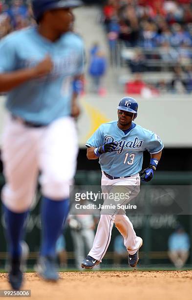 Alberto Callaspo of the Kansas City Royals rounds the bases after hitting a home run during the game against the Cleveland Indians on May 13, 2010 at...