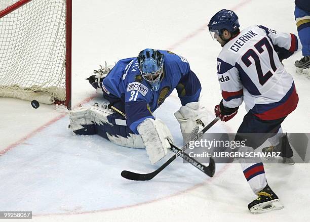 Slovakia's Ivan Ciernik scores past Kazakhstan's Vitali Yeremeyev during the IIHF Ice Hockey World Championship match Kazakhstan vs Slovakia in the...