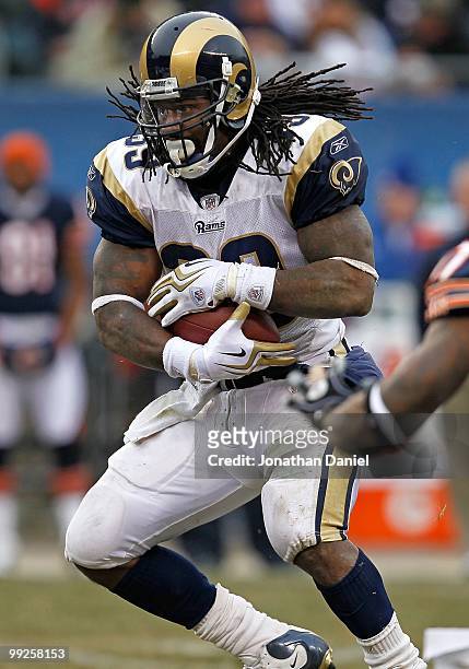 Steven Jackson of the St. Louis Rams runs against the Chicago Bears at Soldier Field on December 6, 2009 in Chicago, Illinois. The Bears defeated the...