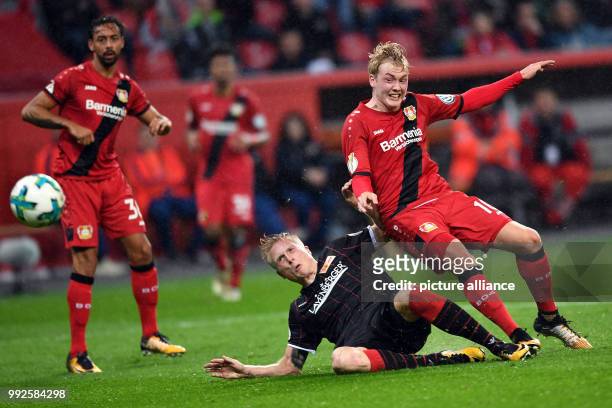 Dpatop - Leverkusen's Julian Brandt scores during the German DFB Pokal soccer cup match between Bayer Leverkusen and 1. FC Union Berlin at the...