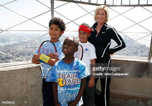 Donovan, Zuhri, Marcos and Chris Evert celebrate National Tennis Month at The Empire State Building on May 13, 2010 in New York City.
