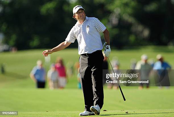 Tim Clark of South Africa reacts to his shot during the final round of THE PLAYERS Championship held at THE PLAYERS Stadium course at TPC Sawgrass on...