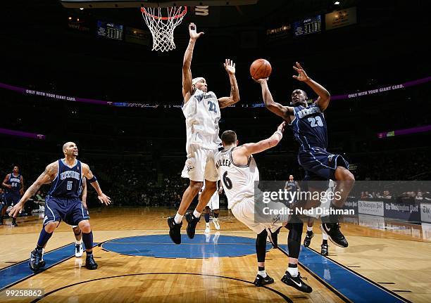 Wesley Matthews of the Utah Jazz goes to the basket against James Singleton and Mike Miller of the Washington Wizards during the game at the Verizon...