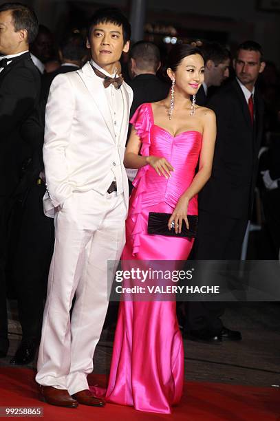 Chinese actress Li Feier and Chinese actor Zi Yi arrive for the screening of the film "Rizhao Chongqing" presented in competiton at the 63rd Cannes...