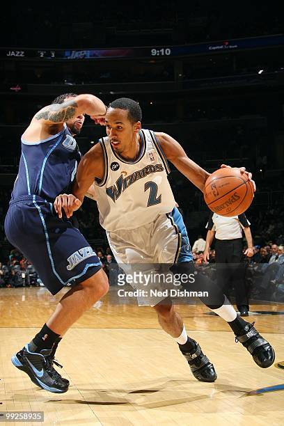 Shaun Livingston of the Washington Wizards dribbles against Deron Williams of the Utah Jazz during the game at the Verizon Center on March 27, 2010...