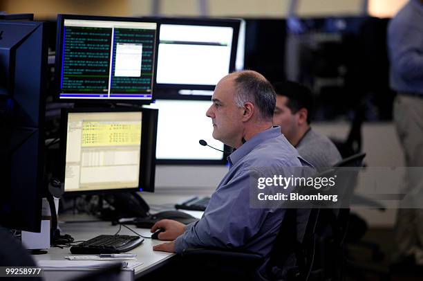 Bud Haimann, supervisor of enterprise technical support, works in CME Group Inc.'s new Global Command Center technology facility in Chicago,...