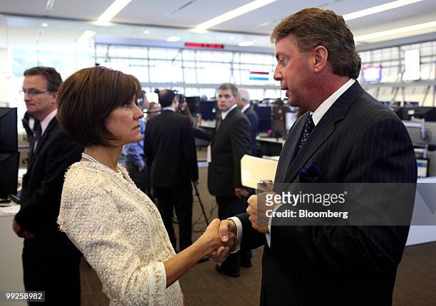 Terrence Duffy, executive chairman, CME Group Inc., right, speaks with Ambassador Capricia Penavic Marshall, U.S. Chief of protocol, during a tour of...