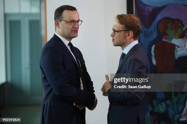 Jens Weidmann , President of the Bundesbank, and Health Minister Jens Spahn attend the weekly German government cabinet meeting on July 6, 2018 in...