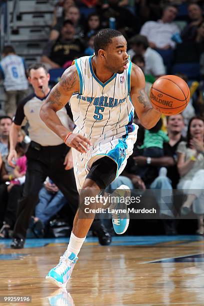 Marcus Thornton of the New Orleans Hornets dribbles against the Charlotte Bobcats during the game at New Orleans Arena on April 7, 2010 in New...