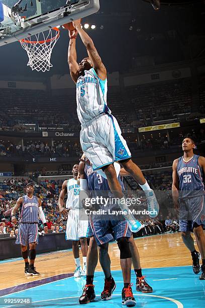 Marcus Thornton of the New Orleans Hornets goes for the dunk against the Charlotte Bobcats during the game at New Orleans Arena on April 7, 2010 in...