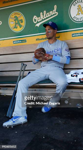 Ryan Goins of the Kansas City Royals sits in the dugout prior to the game against the Oakland Athletics at the Oakland Alameda Coliseum on June 8,...