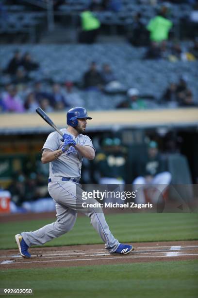 Mike Moustakas of the Kansas City Royals bats during the game against the Oakland Athletics at the Oakland Alameda Coliseum on June 8, 2018 in...