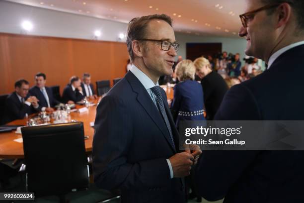 Jens Weidmann , President of the Bundesbank, and Health Minister Jens Spahn attend the weekly German government cabinet meeting on July 6, 2018 in...