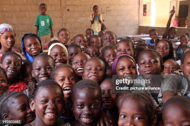 March 2018, Mali, Mopti: Pupils sit inside a class room of the Moulaye Dembele School, built by UNICEF. The extra rooms were established to provide...