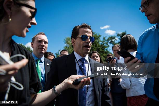 White House communications director Anthony Scaramucci talks with reporters and members of the media outside the West Wing at the White House in...