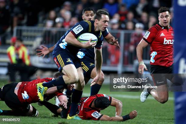 Ben Smith of the Highlanders makes a break during the round 18 Super Rugby match between the Crusaders and the Highlanders at AMI Stadium on July 6,...