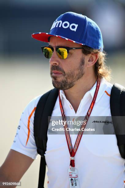 Fernando Alonso of Spain and McLaren F1 arrives at the circuit before practice for the Formula One Grand Prix of Great Britain at Silverstone on July...