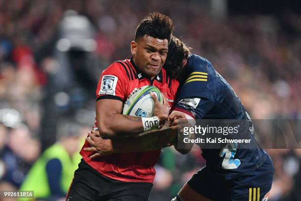 Seta Tamanivalu of the Crusaders is tackled during the round 18 Super Rugby match between the Crusaders and the Highlanders at AMI Stadium on July 6,...