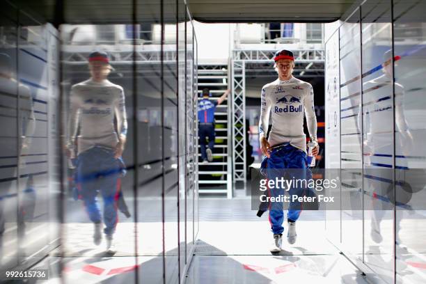 Brendon Hartley of New Zealand and Scuderia Toro Rosso walks into the garage during practice for the Formula One Grand Prix of Great Britain at...
