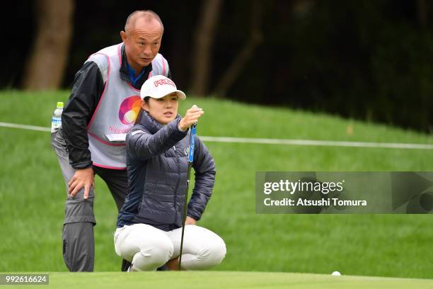 Rie Tsuji of Japan lines up her putt on the 4th hole during the first round of the Nipponham Ladies Classic at the Ambix Hakodate Club on July 6,...