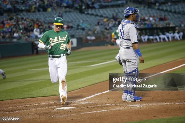 Matt Chapman of the Oakland Athletics scores during the game against the Kansas City Royals at the Oakland Alameda Coliseum on June 8, 2018 in...