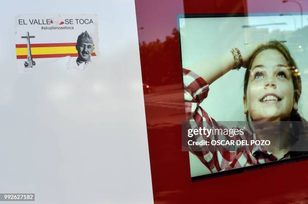 Sticker reading 'Do not touch The Valley' and depecting a portrait of General Francisco Franco is pictured in a street of Madrid on July 02, 2018. -...