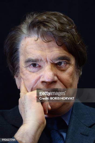 French businessman Bernard Tapie, owner of the French newspaper La Provence, poses as he attends the inauguration of an auto show in Marseille,...