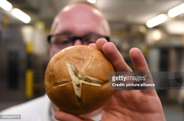 Food expert Malte Gerken with bread rolls in a bakery in Bremerhaven, Germany, 27 September 2017. Gerken is attempting to develop a special dough...