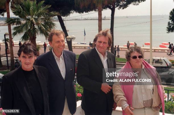 This file picture, taken on April 13, 1997 in Cannes, shows French actor Gerard Depardieu next to French director Josee Dayan , French vice-president...