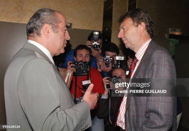 Francis Bouygues talks with general director Etienne Mougeotte , before the press conference given to present the time schedule of the TV channel, 06...
