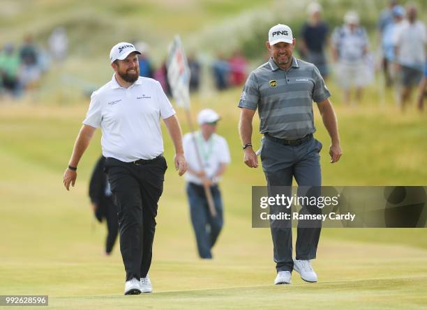 Donegal , Ireland - 6 July 2018; Shane Lowry, left, of Ireland and Lee Westwood of England chat on the 15th fairway during Day Two of the Dubai Duty...