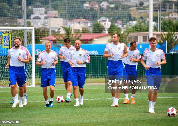 Players from the Russian national football team attend a training session at the Park Arena in Sochi on July 6 on the eve of the Russia 2018 FIFA...