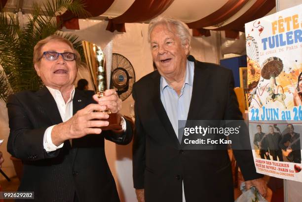 Producer Orlando and Massimo Gargia Attend "La Femme Dans Le Siecle" Dinner on July 5, 2018 in Paris, France.